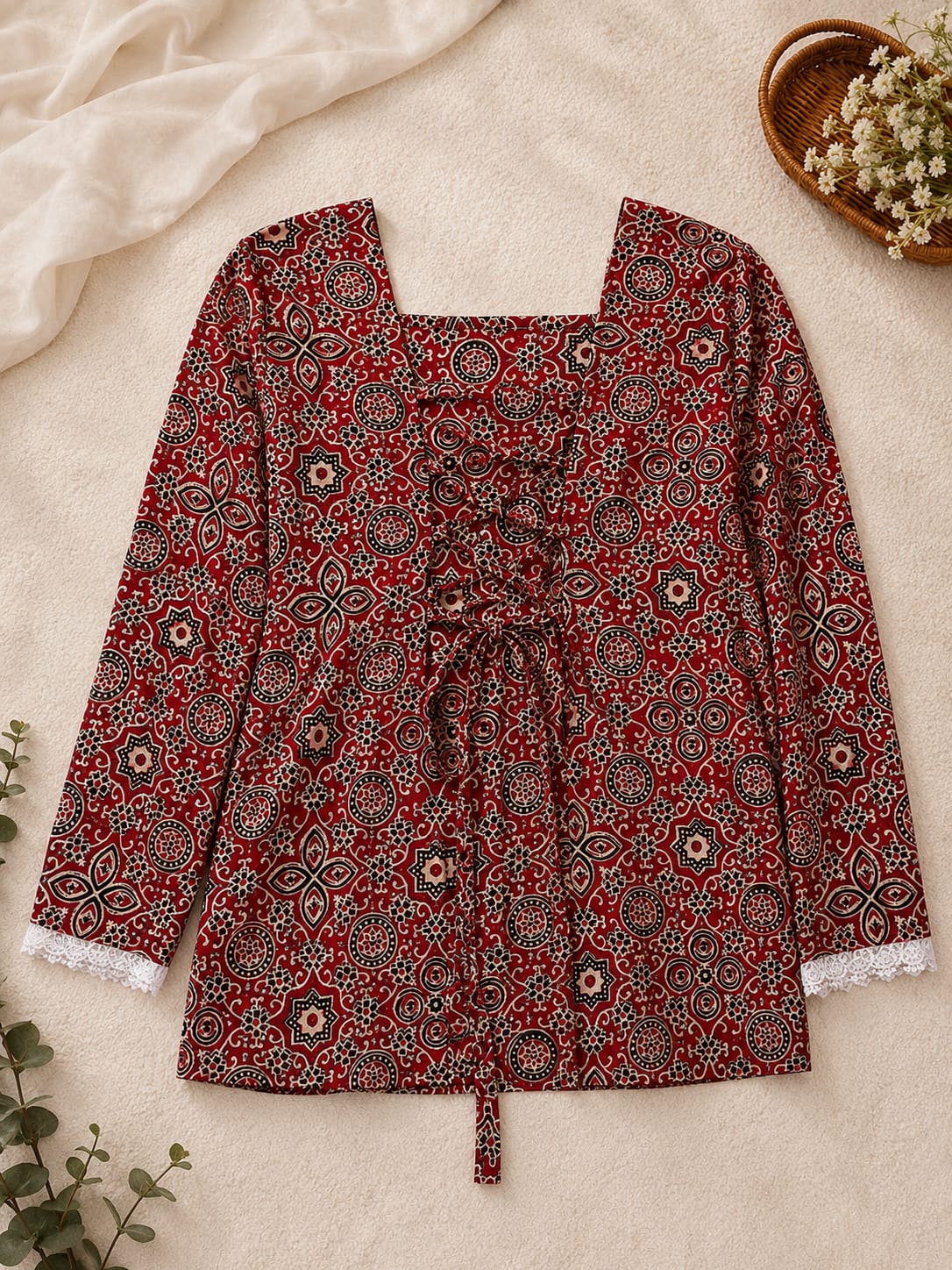 Red printed women's kurta with square neckline, lace sleeves and tie-up waist