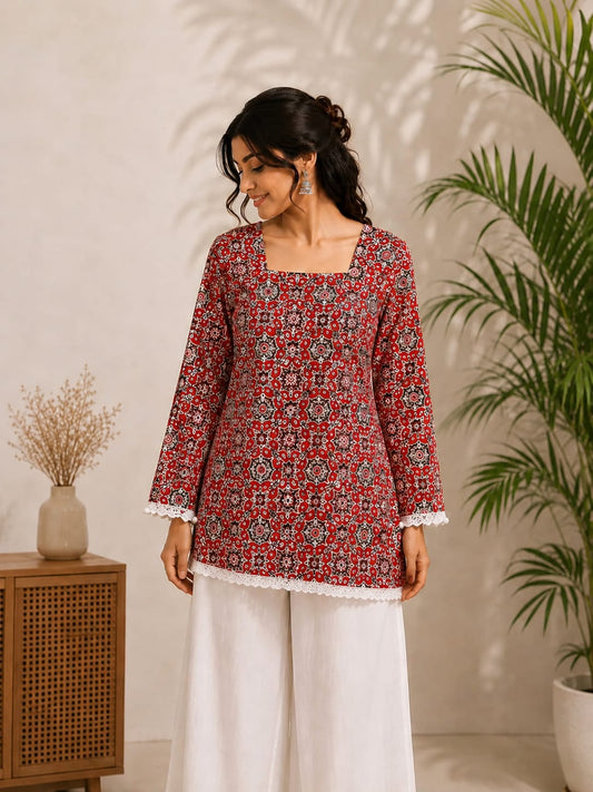 Front view of red printed kurta set with white palazzo for women